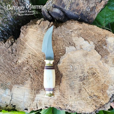 Elegance & Precision: White Bone Adventure Tool